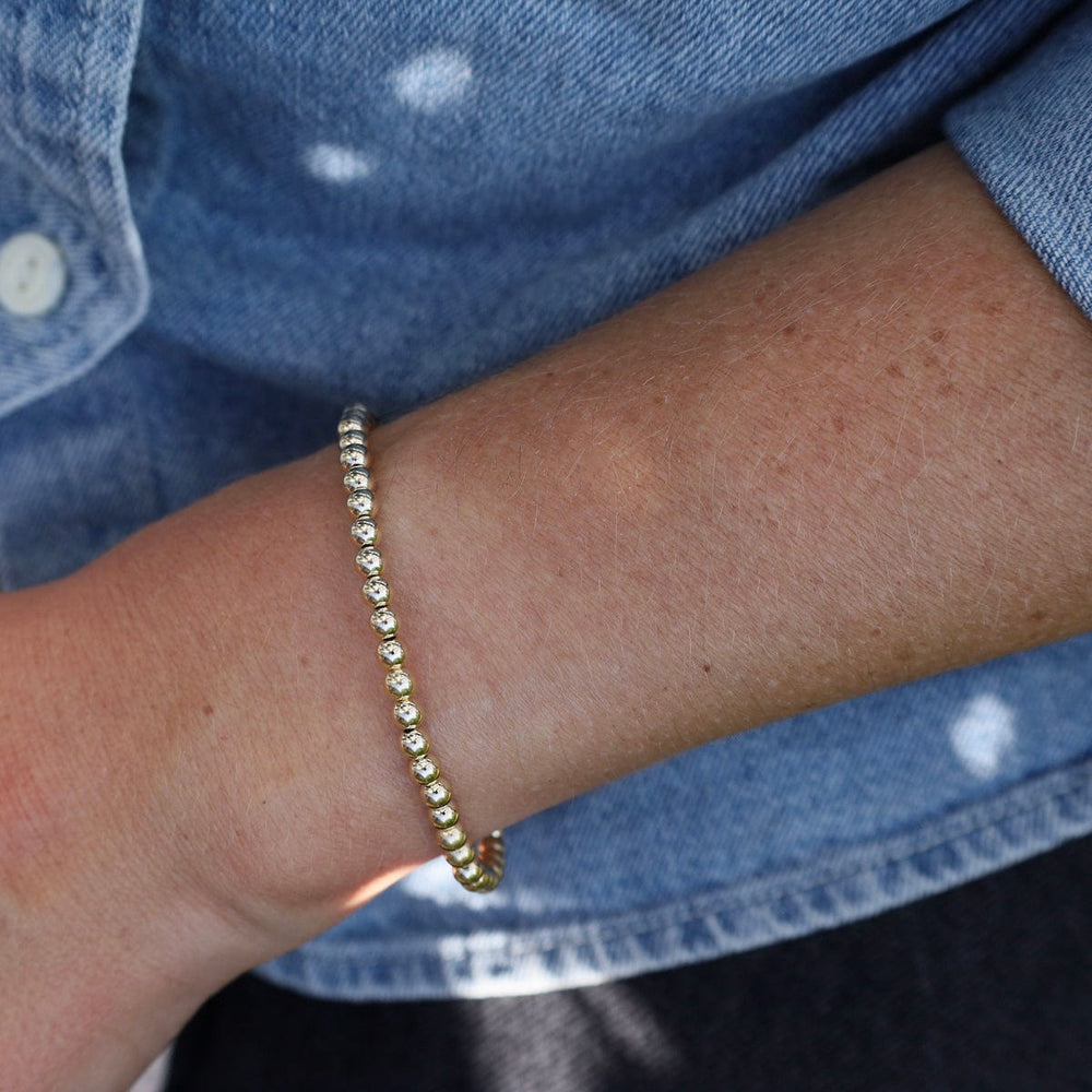 
                      
                        BRC 4mm Classic Ball Bracelet in Silver, Gold, or Two Tone
                      
                    