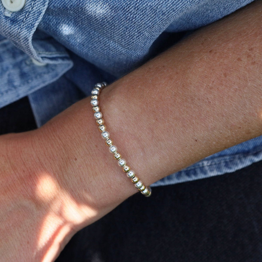 
                      
                        BRC 4mm Classic Ball Bracelet in Silver, Gold, or Two Tone
                      
                    