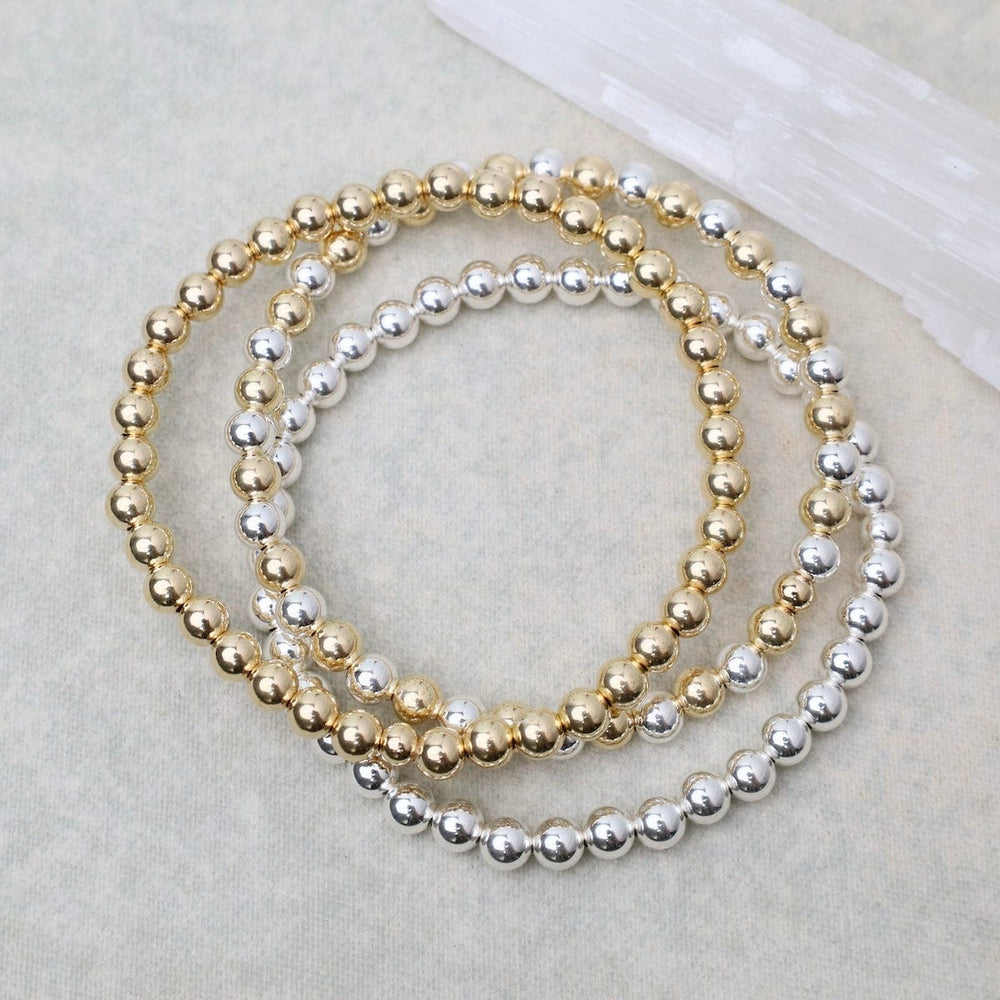 
                      
                        BRC 5mm Classic Ball Bracelet in Silver, Gold, or Two Tone
                      
                    