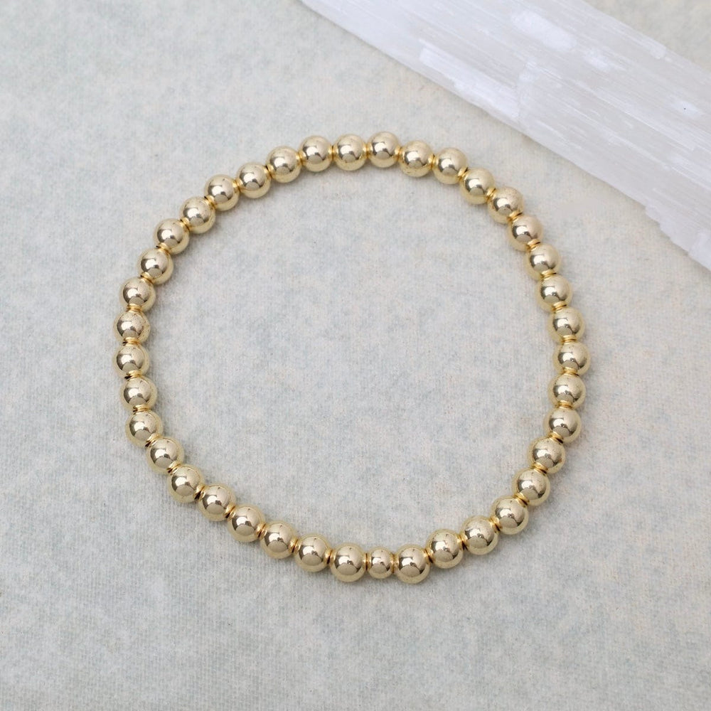 
                      
                        BRC 5mm Classic Ball Bracelet in Silver, Gold, or Two Tone
                      
                    