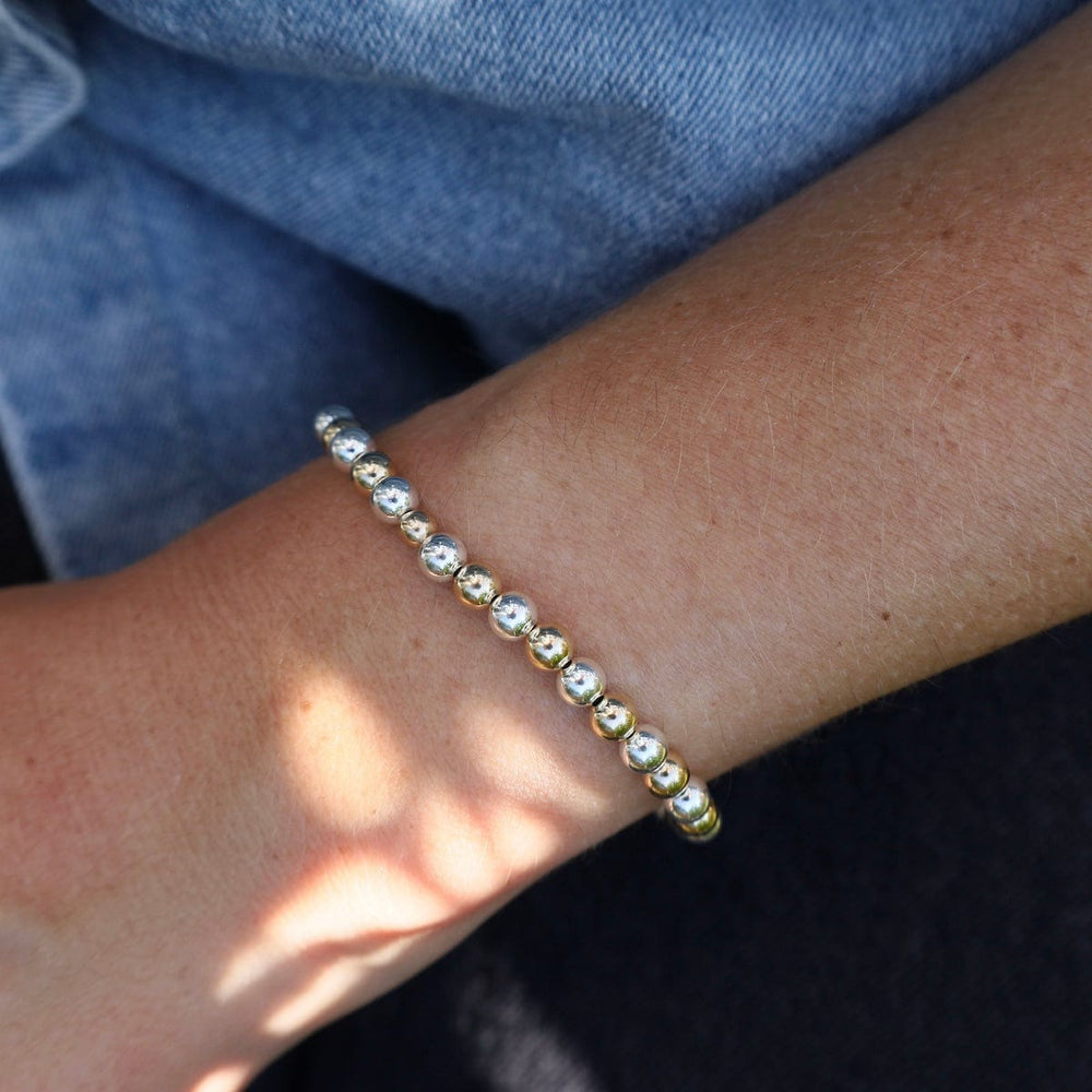 
                      
                        BRC 5mm Classic Ball Bracelet in Silver, Gold, or Two Tone
                      
                    