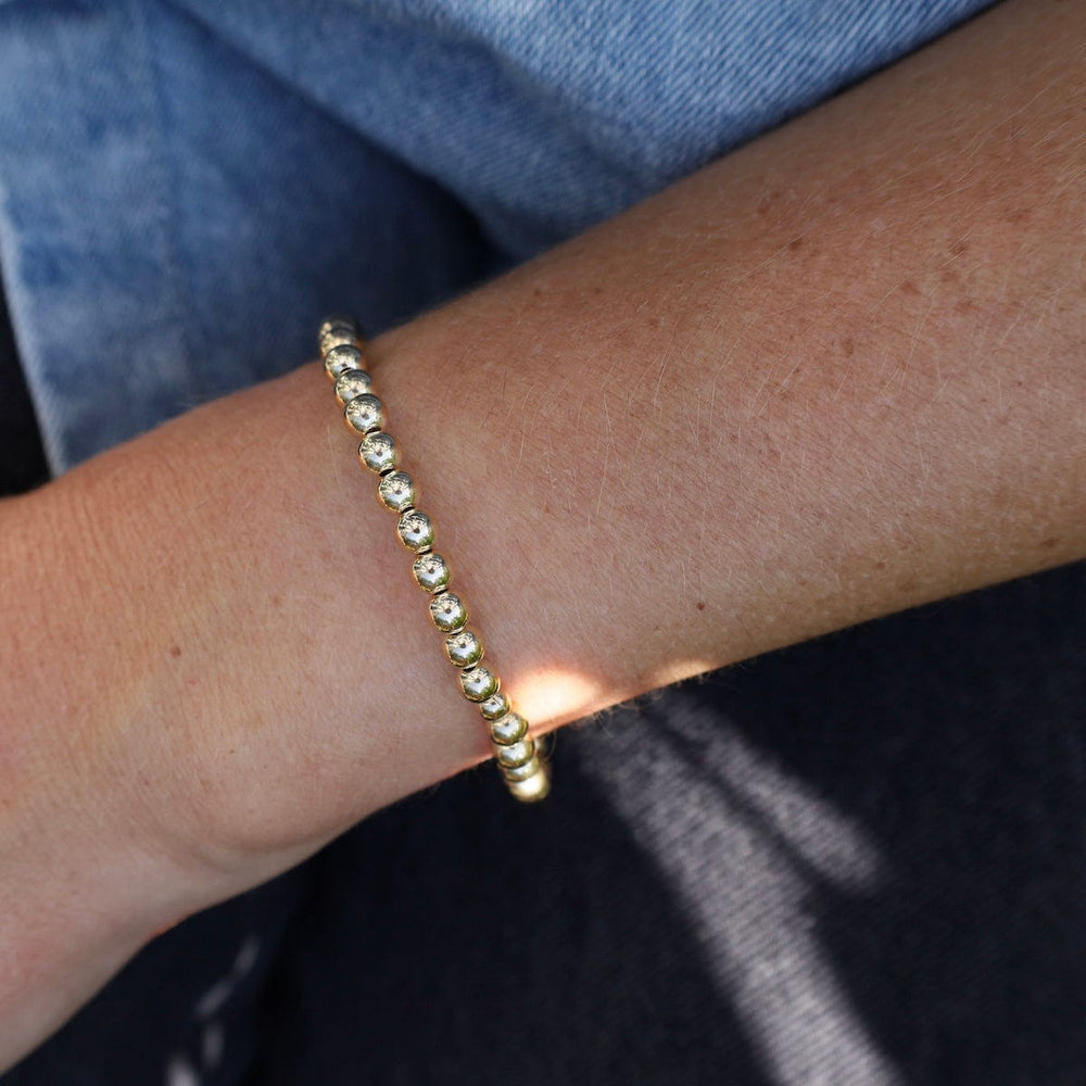 
                      
                        BRC 5mm Classic Ball Bracelet in Silver, Gold, or Two Tone
                      
                    