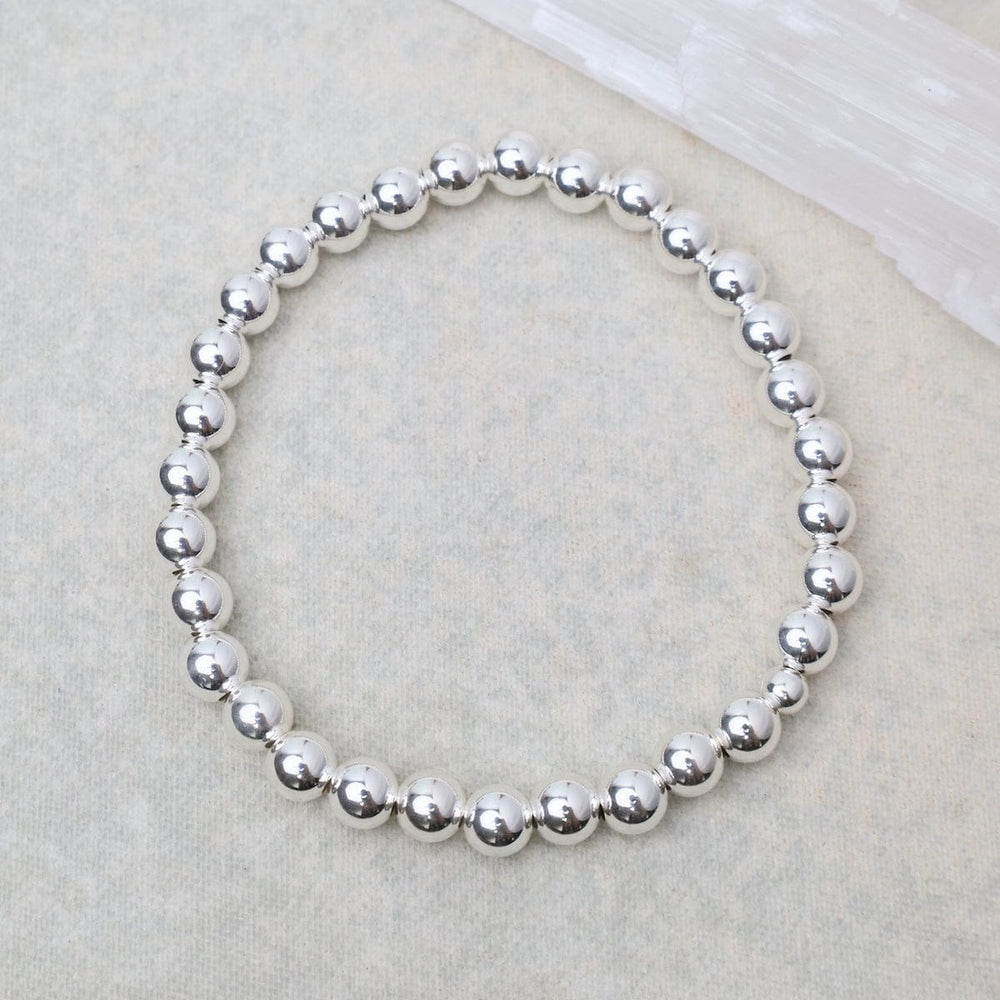 
                      
                        BRC 6mm Classic Ball Bracelet in Silver, Gold, or Two Tone
                      
                    