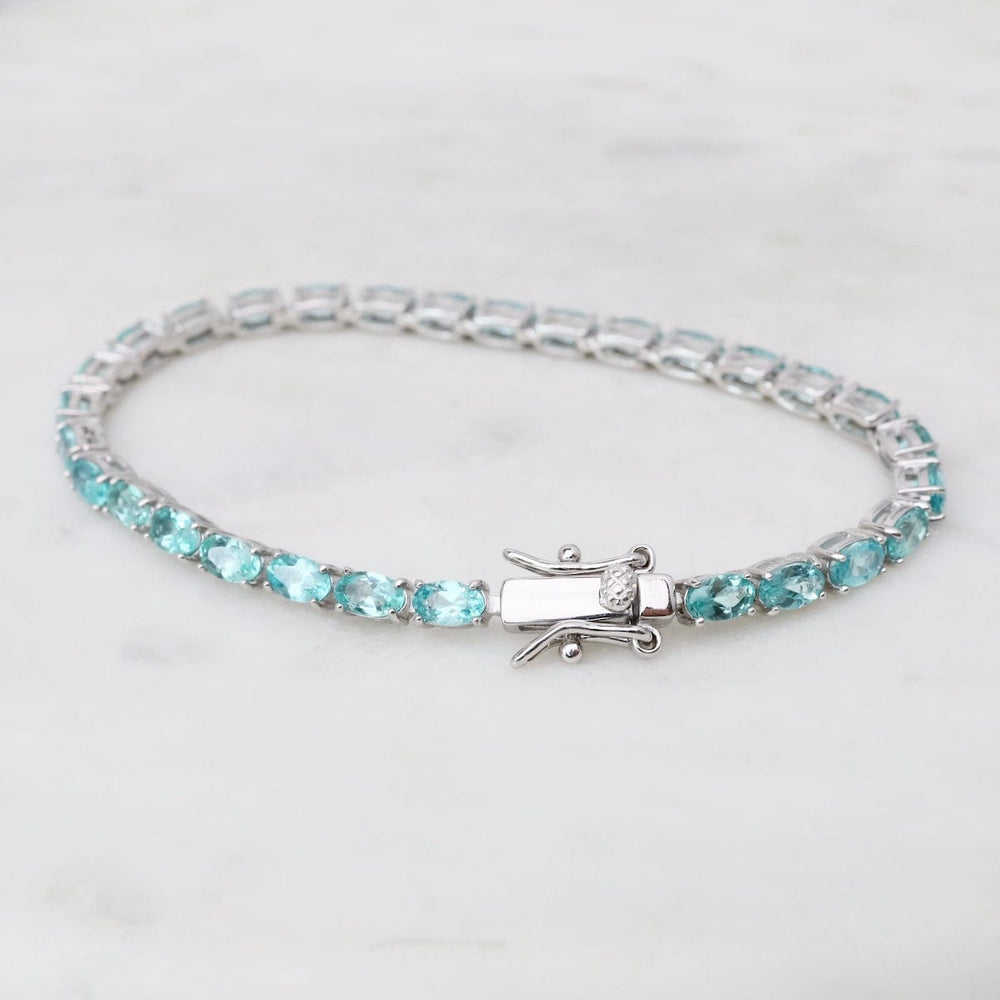 
                  
                    BRC 7.5" 3x5mm Oval Blue Apatite Tennis Bracelet
                  
                