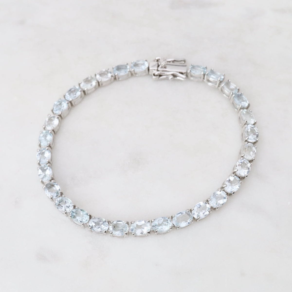 BRC 7.5" 4x5mm Oval Aquamarine Tennis Bracelet