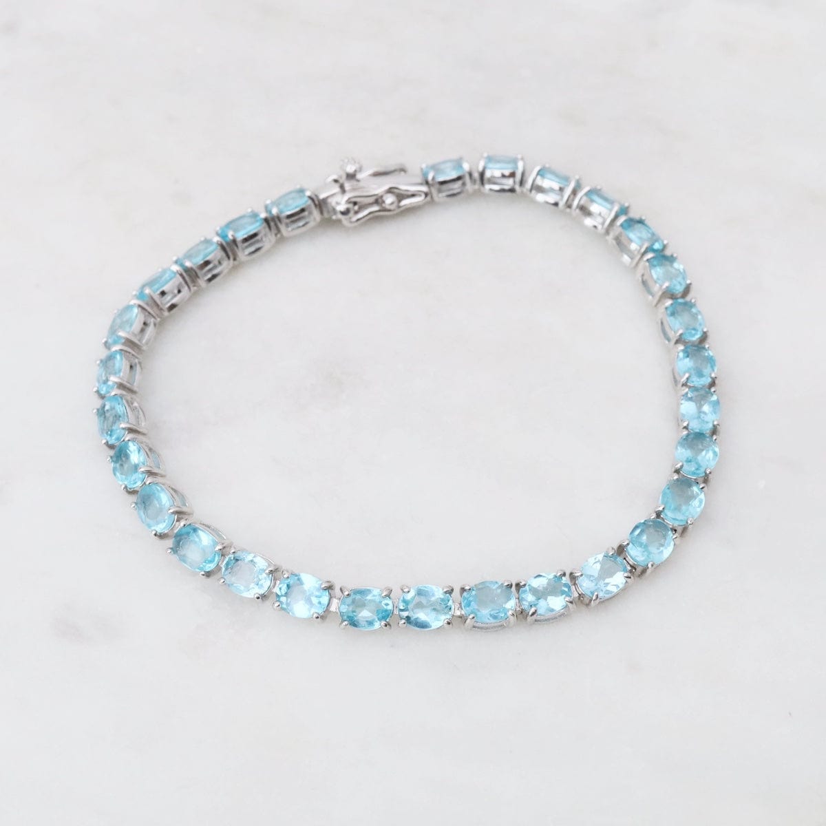 BRC 7.5" 4x5mm Oval Blue Apatite Tennis Bracelet