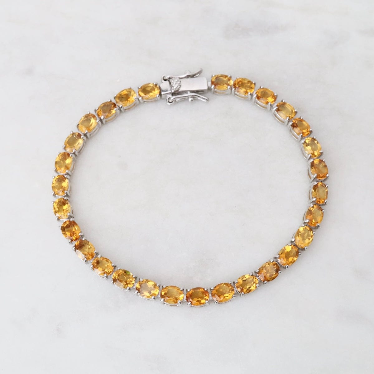 BRC 7.5" 4x5mm Oval Citrine Tennis Bracelet