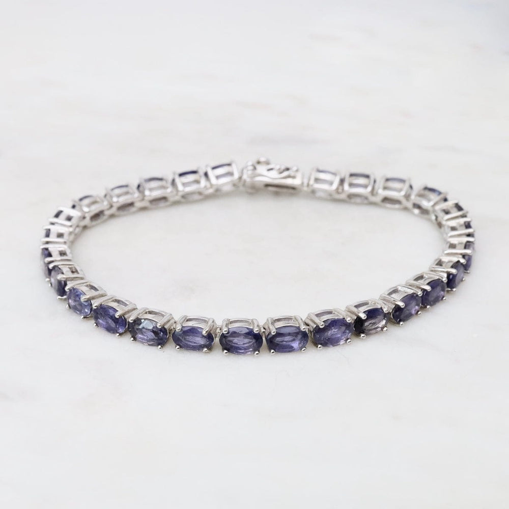 BRC 7.5" 4x5mm Oval Iolite Tennis Bracelet