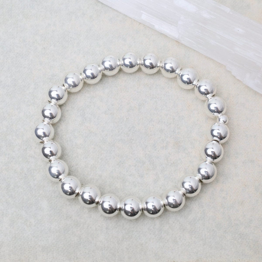 
                      
                        BRC 8mm Classic Ball Bracelet in Silver, Gold, or Two Tone
                      
                    