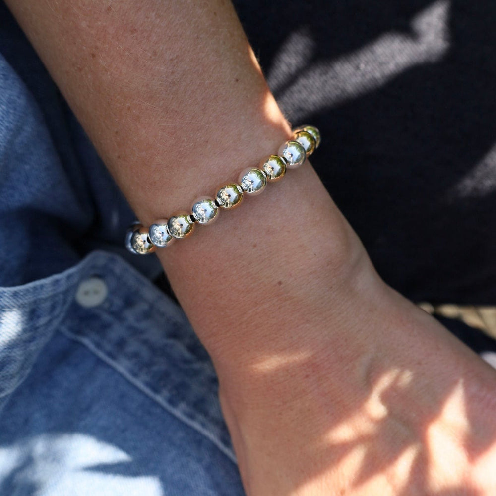 
                      
                        BRC 8mm Classic Ball Bracelet in Silver, Gold, or Two Tone
                      
                    