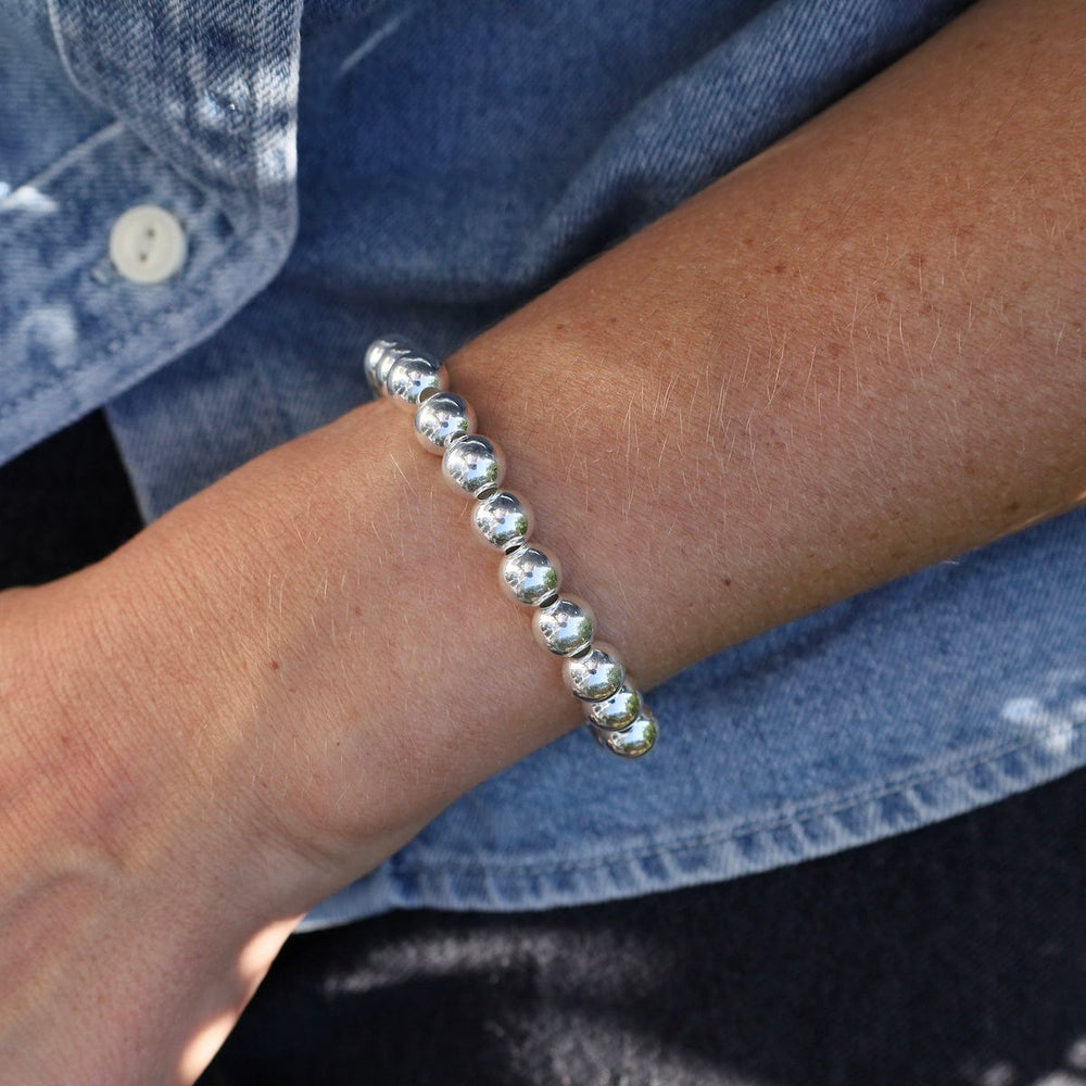 
                      
                        BRC 8mm Classic Ball Bracelet in Silver, Gold, or Two Tone
                      
                    