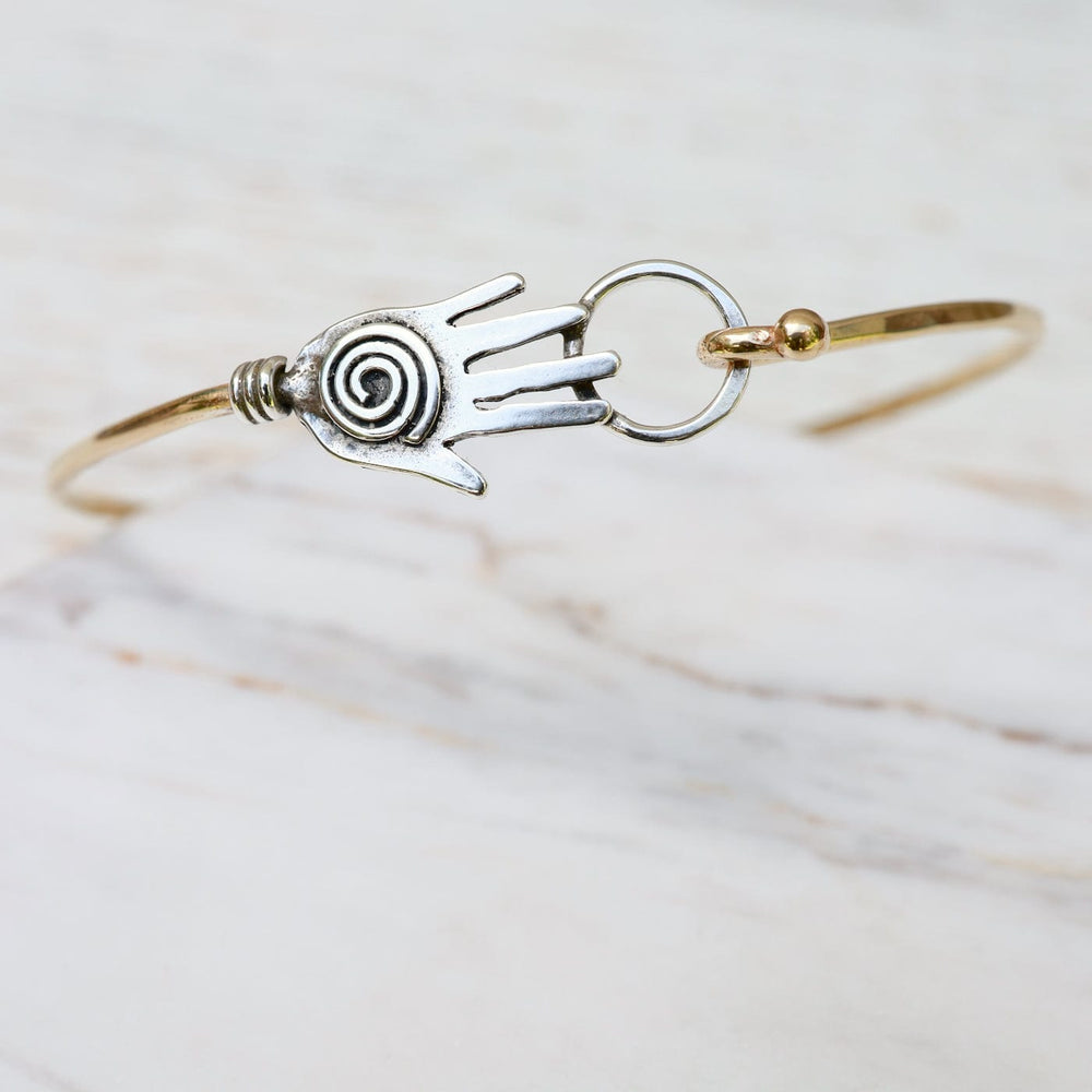 
                  
                    BRC-BRASS Brass Bracelet with Silver Hamsa
                  
                