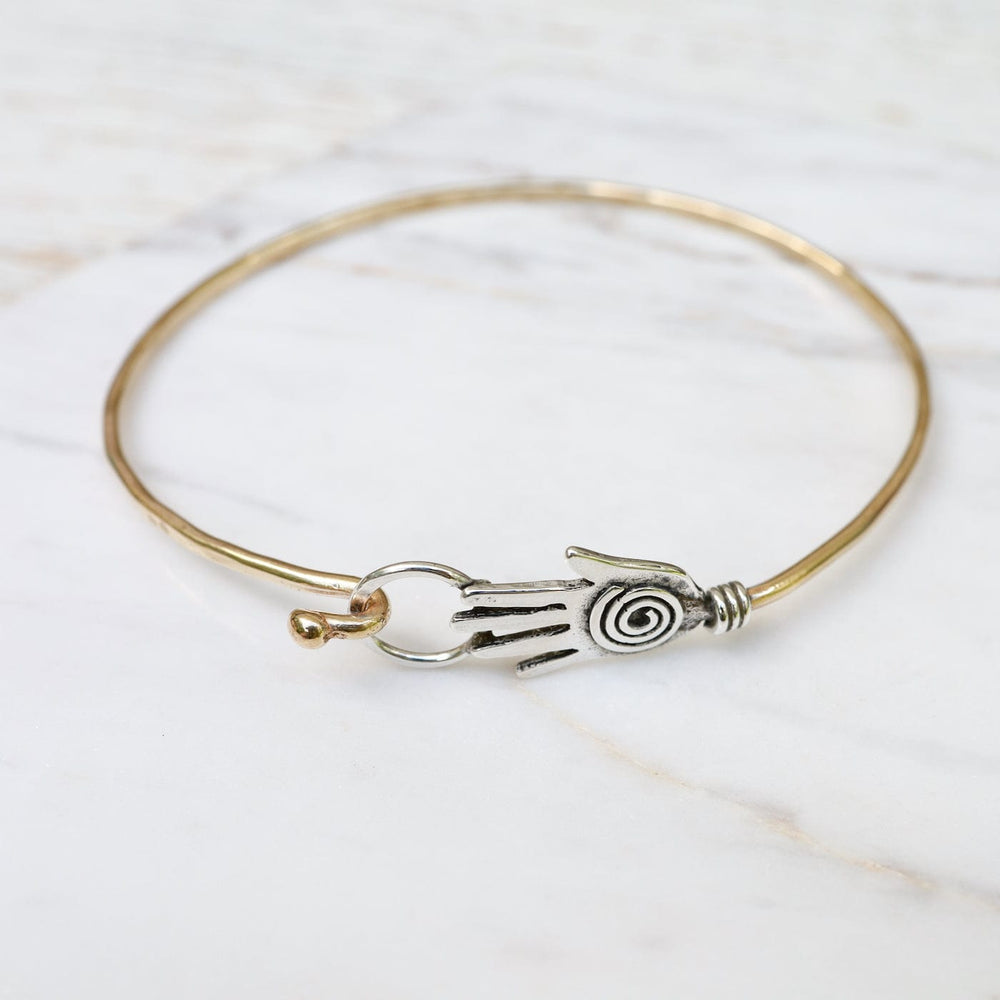 
                  
                    BRC-BRASS Brass Bracelet with Silver Hamsa
                  
                