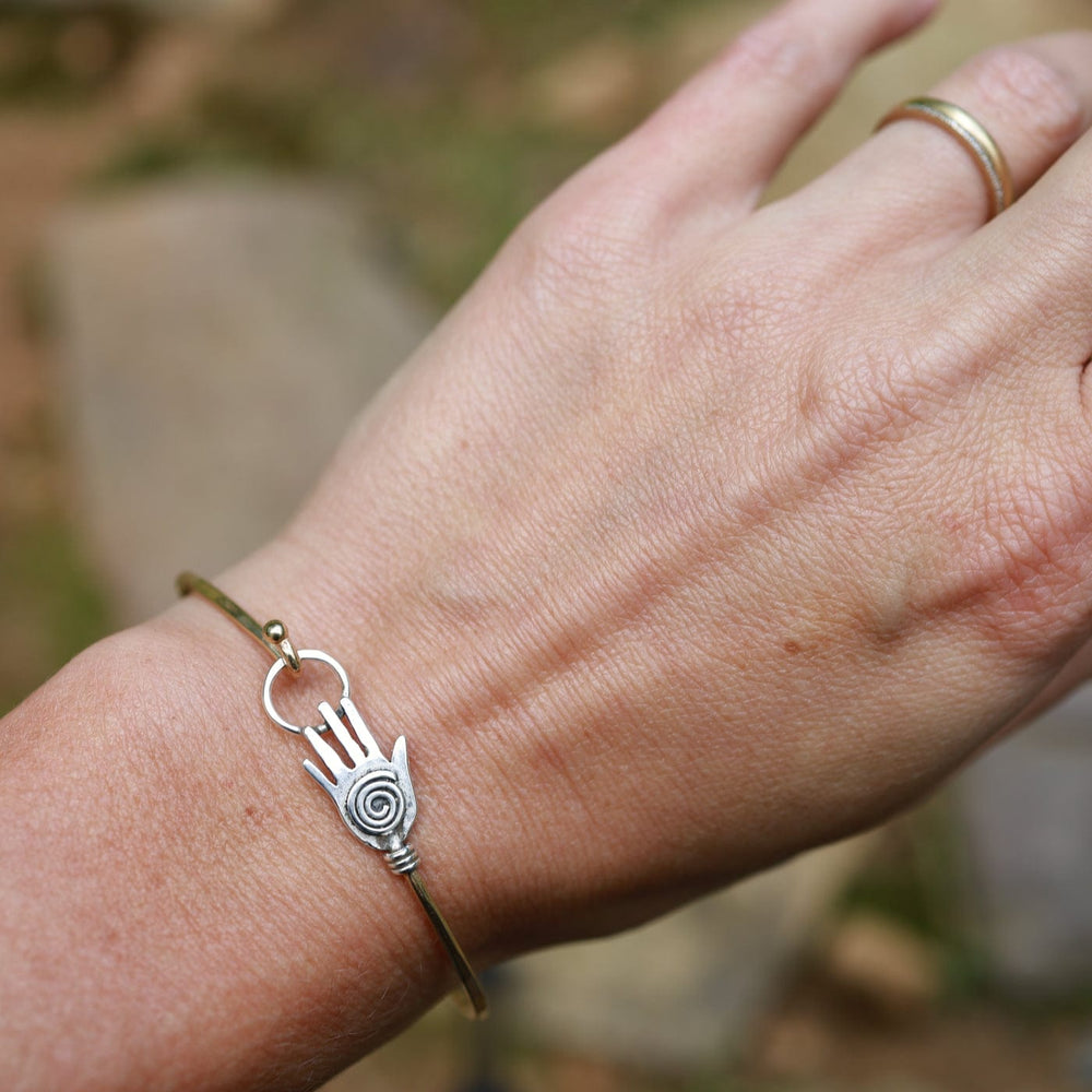 
                  
                    BRC-BRASS Brass Bracelet with Silver Hamsa
                  
                