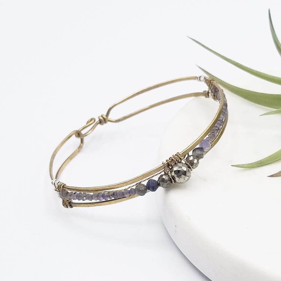 BRC-BRASS HAND FORMED BRASS CHANNEL BRACELET WITH PYRITE AND IOLITE