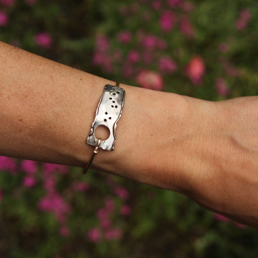 
                  
                    BRC Brass Hook Bangle with Sterling Silver Reticulated Rectangle
                  
                