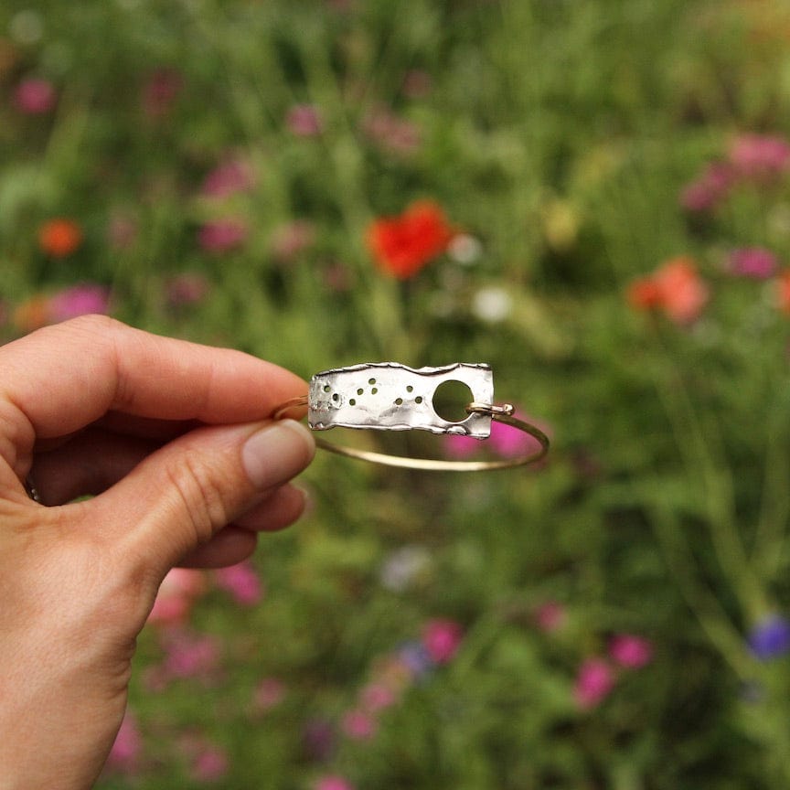 
                  
                    BRC Brass Hook Bangle with Sterling Silver Reticulated Rectangle
                  
                