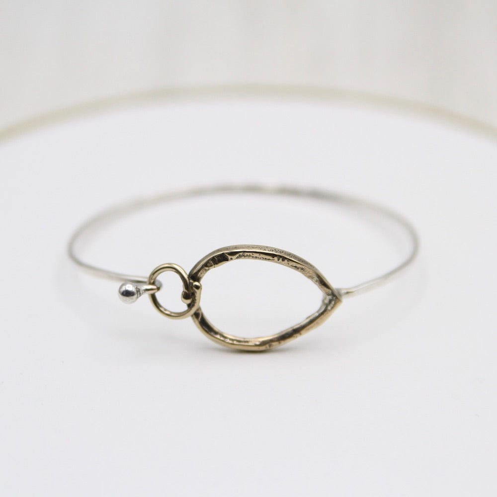 Brass Pear and Circle Clasp on Sterling Silver Bangle – Dandelion