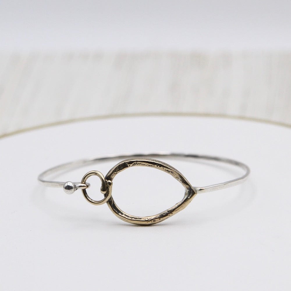 
                  
                    BRC Brass Pear and Circle Clasp on Sterling Silver Bangle
                  
                