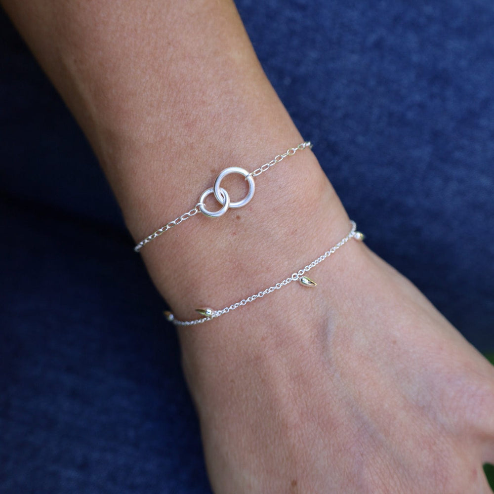 
                  
                    BRC Brushed Sterling Silver Double Ring Bracelet
                  
                