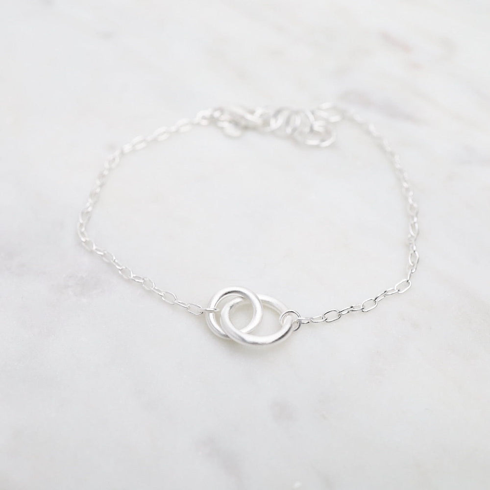 
                  
                    BRC Brushed Sterling Silver Double Ring Bracelet
                  
                