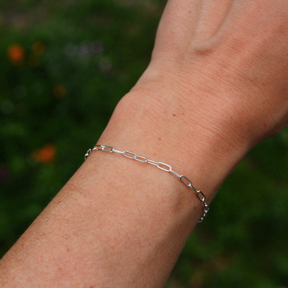 
                      
                        BRC Delicate Sterling Silver Flat Drawn Cable Chain Bracelet
                      
                    