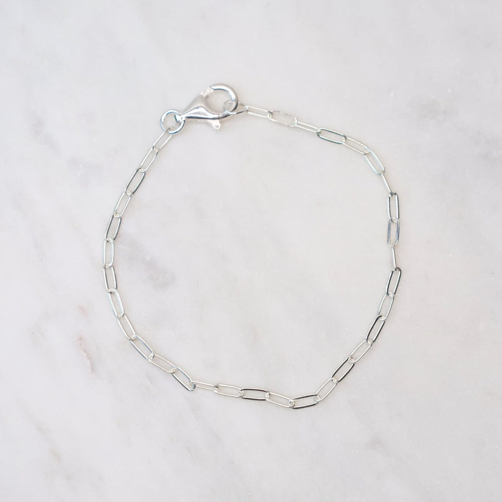 
                      
                        BRC Delicate Sterling Silver Flat Drawn Cable Chain Bracelet
                      
                    