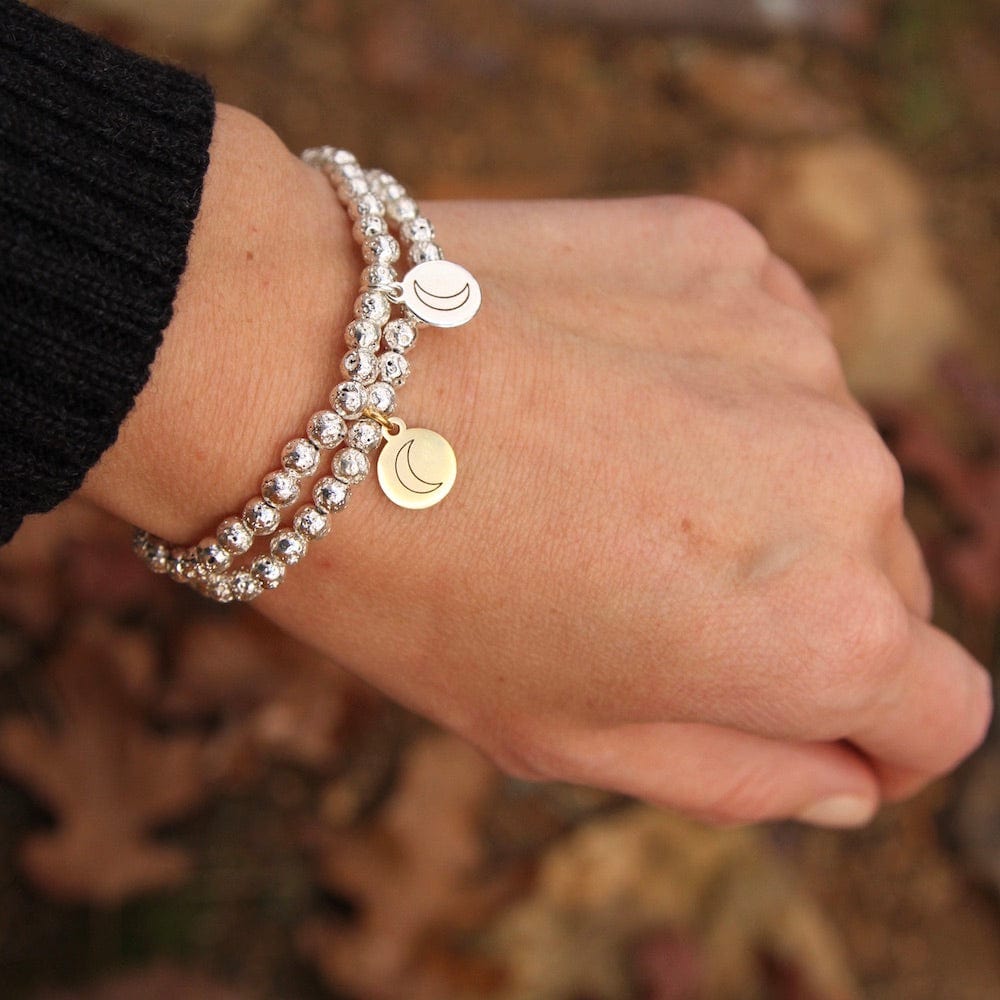 
                      
                        BRC Dreamer ~ Stretchy Silver Coated Lavastone Bracelet - Gold Charm
                      
                    