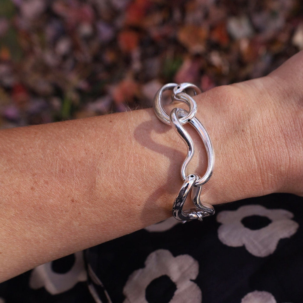 
                  
                    BRC Electroform Kidney Bean Shaped Link Bracelet
                  
                