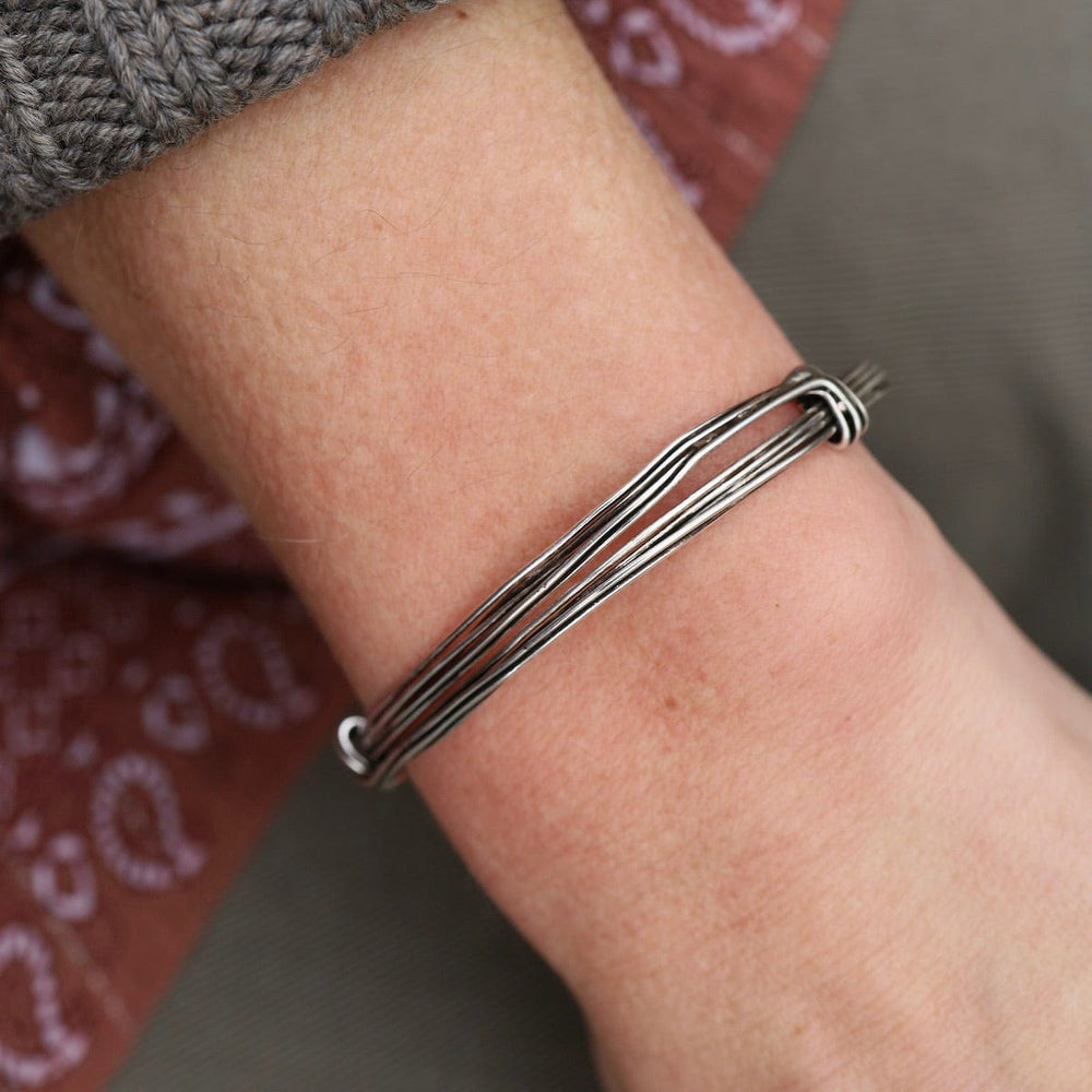 
                      
                        BRC Elephant Hair Inspired Bangle - Oxidized Sterling Silver - 5 Lines
                      
                    