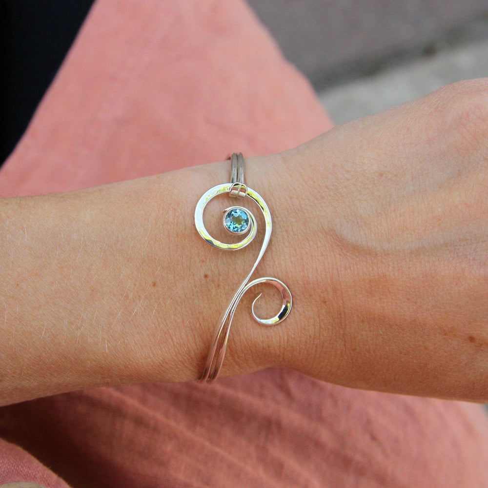 
                      
                        BRC Fiddlehead Bracelet with Blue Topaz
                      
                    