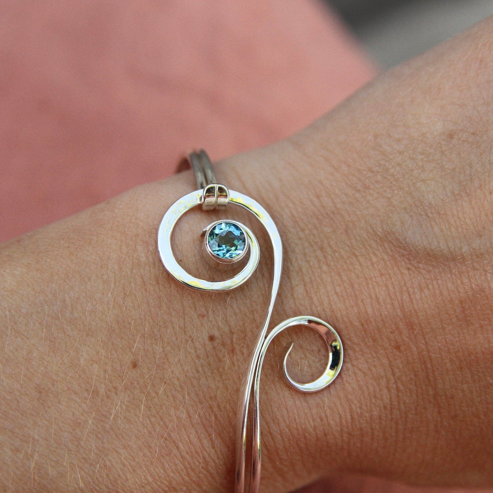 
                      
                        BRC Fiddlehead Bracelet with Blue Topaz
                      
                    