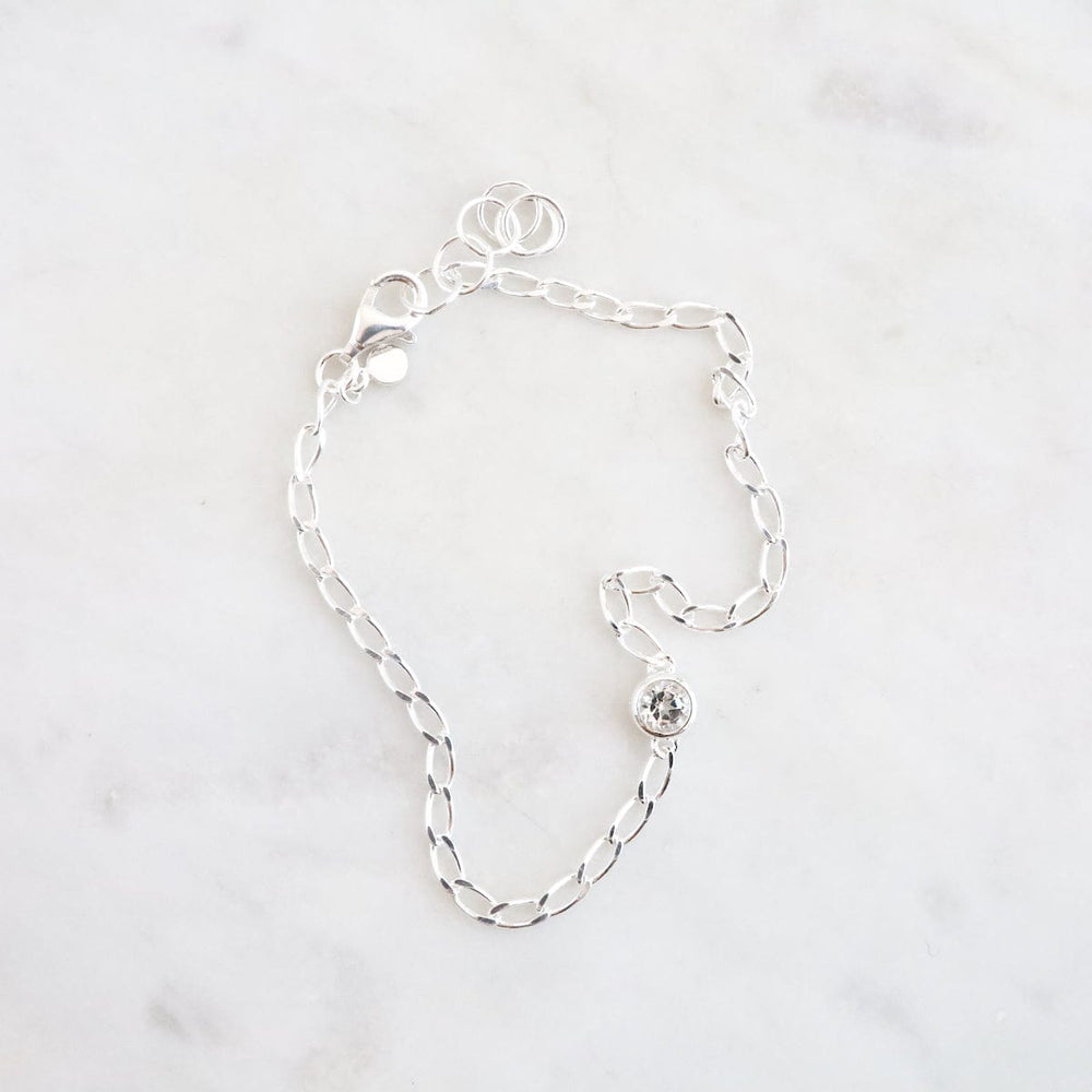 
                  
                    BRC Fine Cut Curb Chain with Round Bezel Set White Topaz Bracelet
                  
                