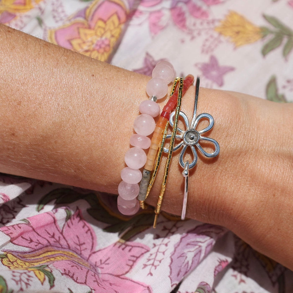 
                      
                        BRC Five Petal Flower Clasp Bangle Bracelet
                      
                    