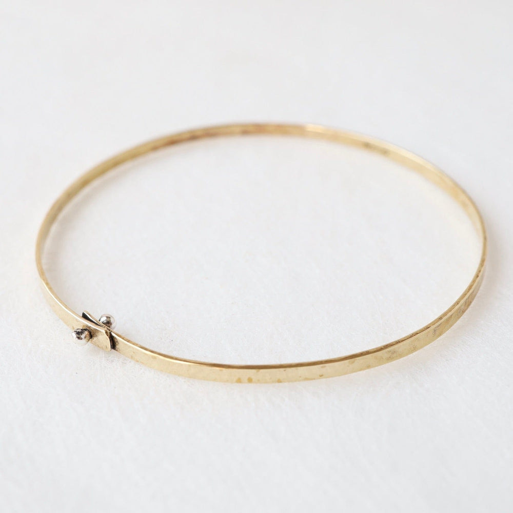 
                  
                    BRC Flat Brass Bangle Bracelet with Tiny Sterling Silver Rivet
                  
                