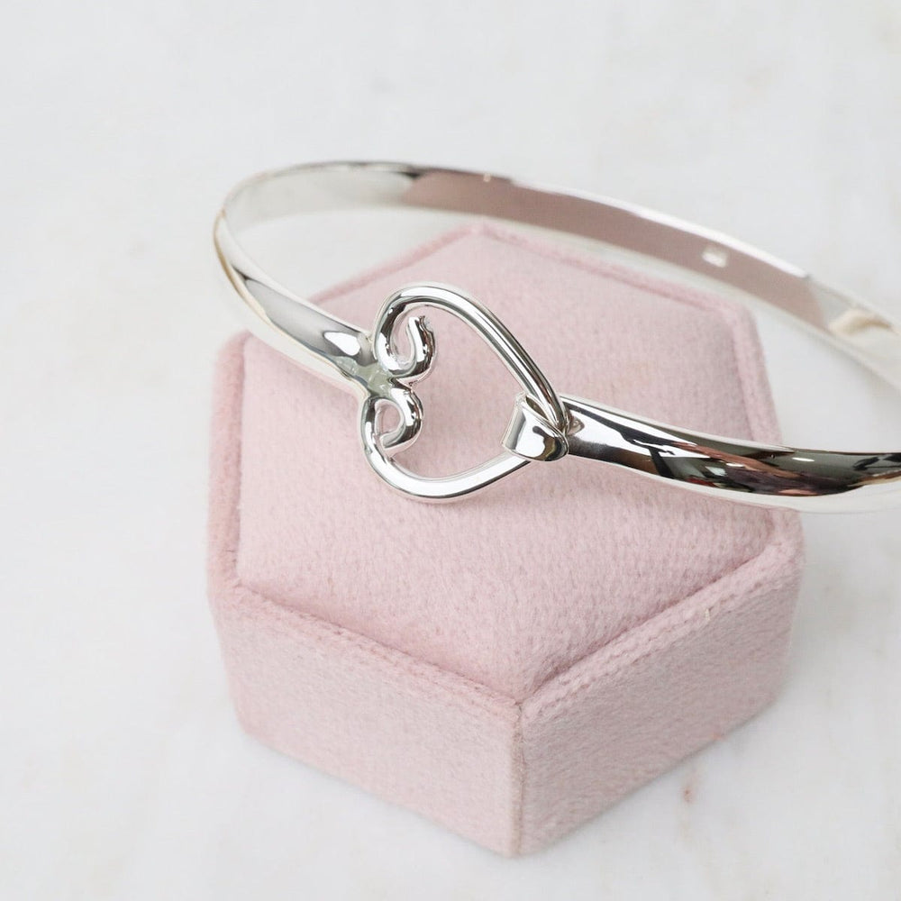 
                      
                        BRC Front Latching Bangle with Heart in Front
                      
                    