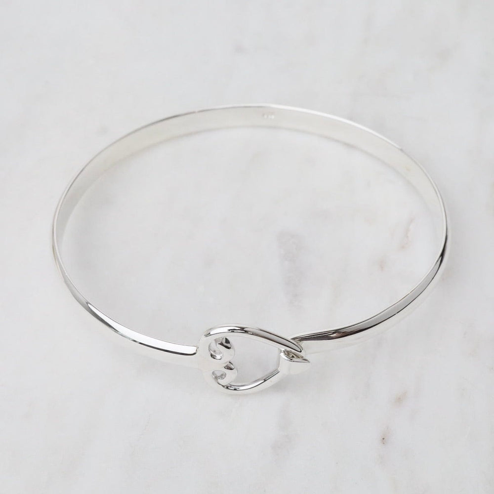 
                      
                        BRC Front Latching Bangle with Heart in Front
                      
                    