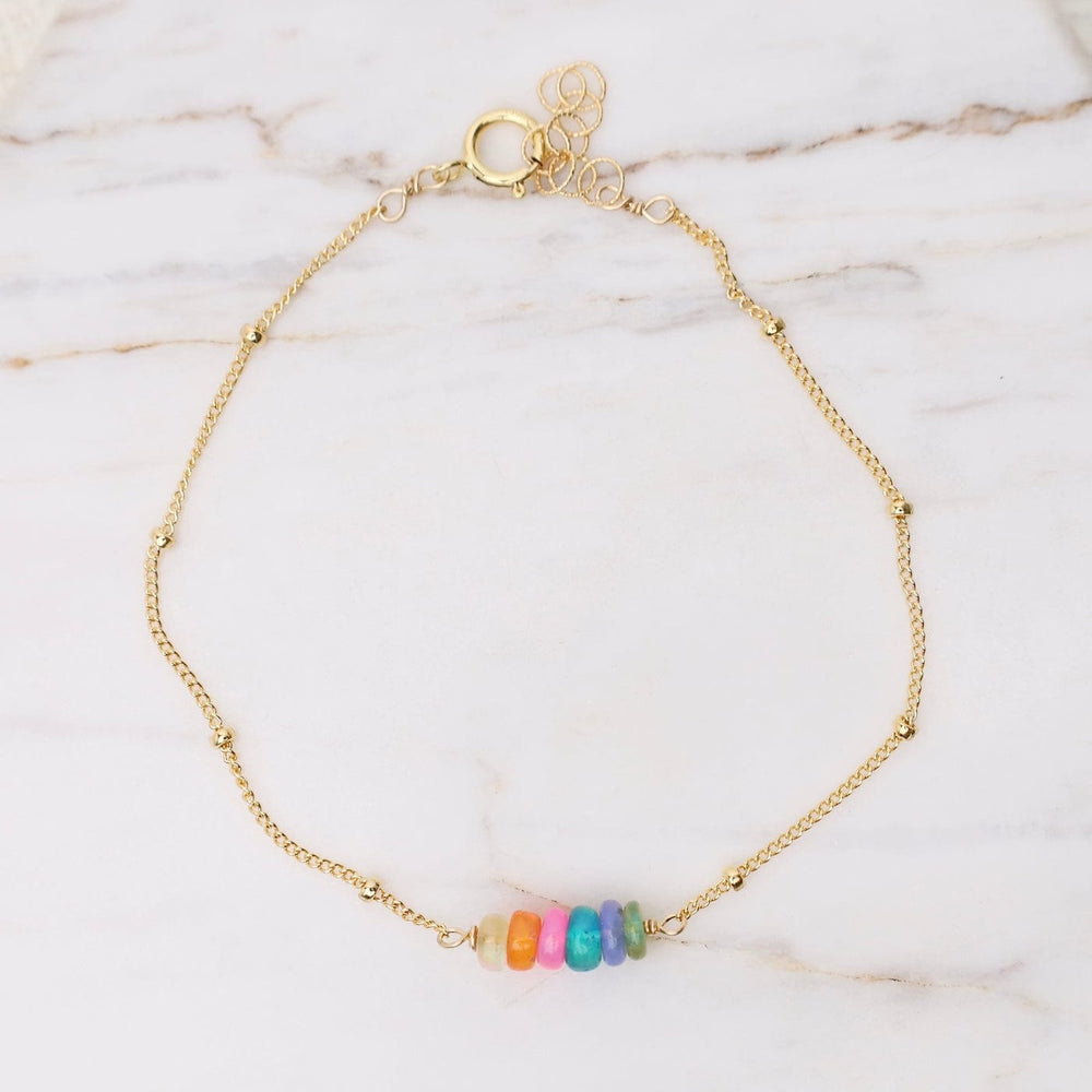 
                  
                    BRC-GF Gold Filled Rainbow Opals Rondelle Bar on Beaded C
                  
                