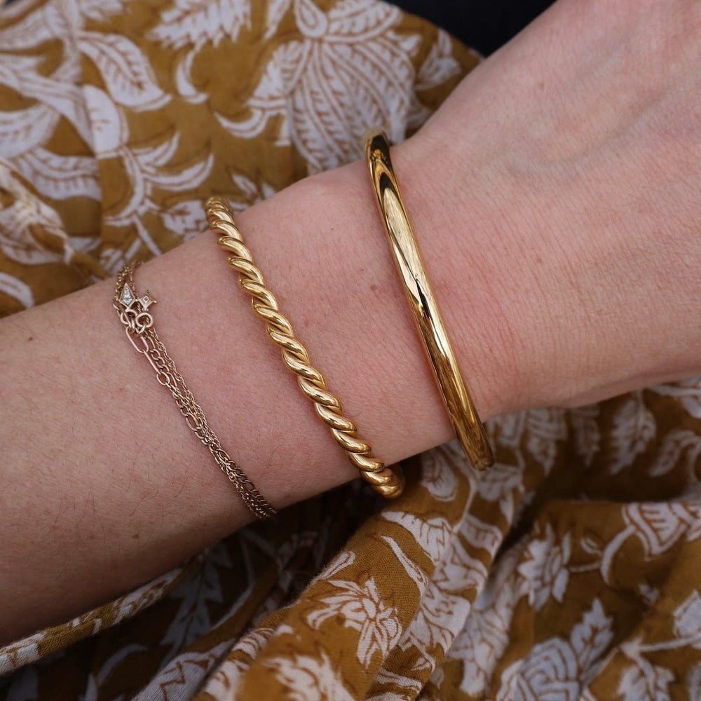 BRC-GPL ALIZE // The twisted bangle - 18k gold plated stai