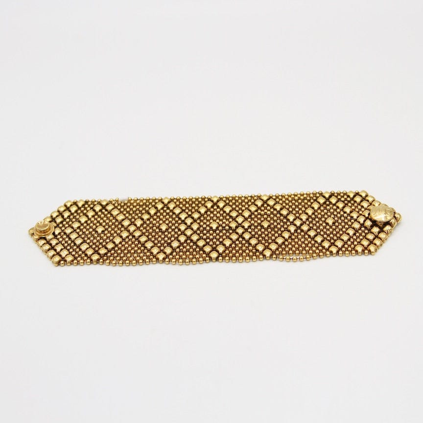 
                  
                    BRC-GPL Diamond and X Pattern Antique Gold Mesh Bracelet
                  
                