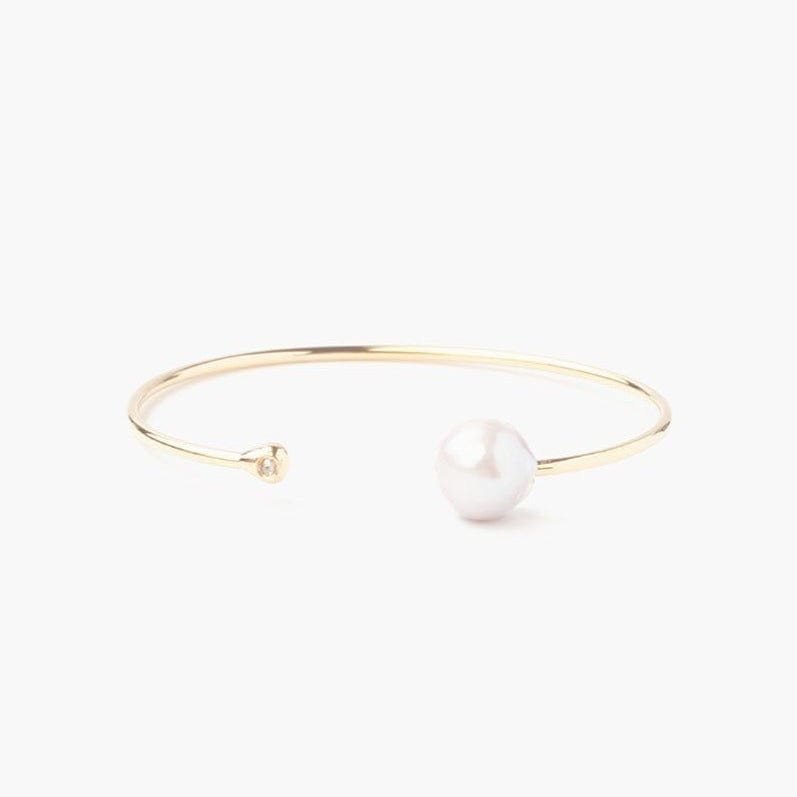 
                      
                        BRC-GPL Gold Plated White Pearl & Diamond Cuff
                      
                    