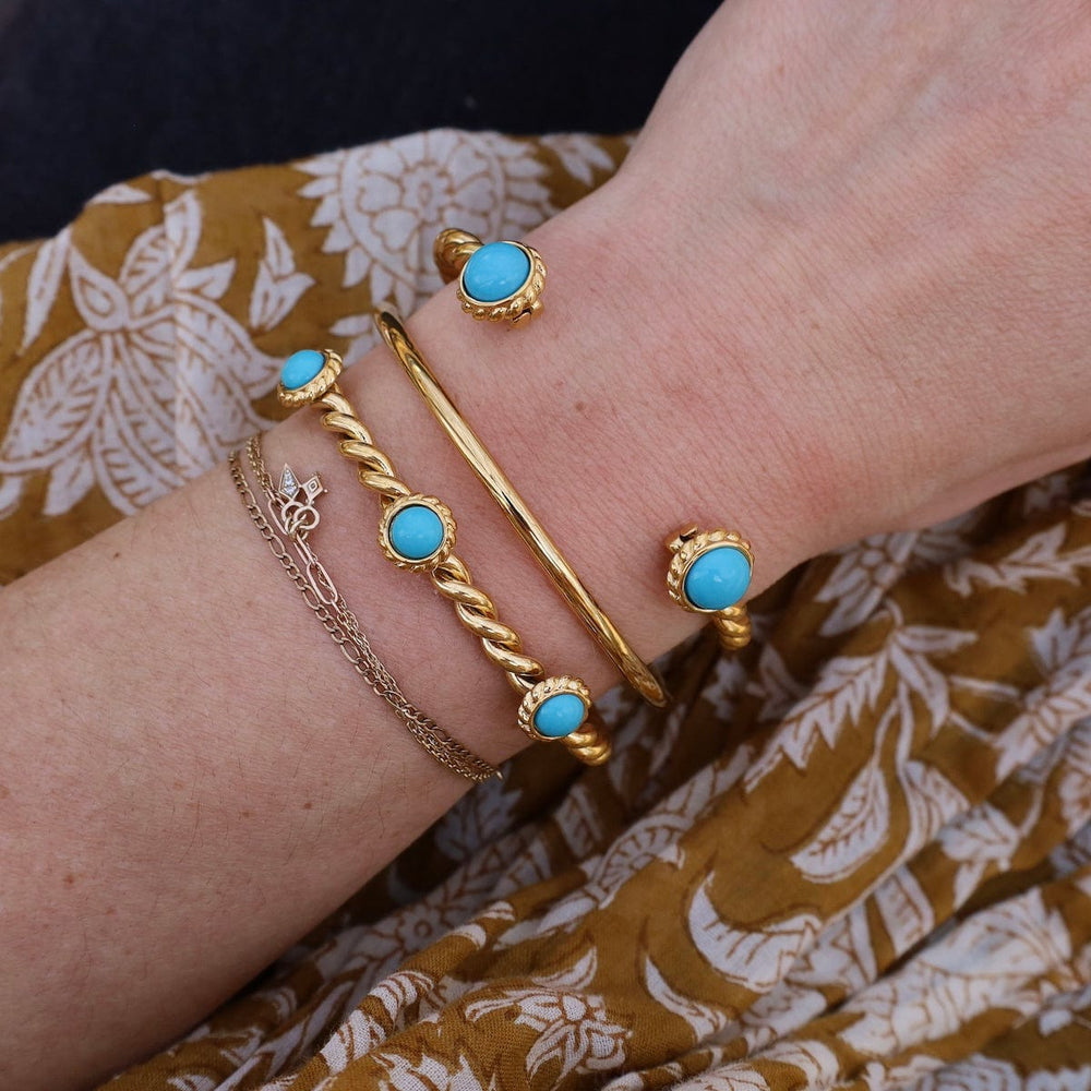 
                  
                    BRC-GPL PIPA BLUE/ The 2 blue stone bangle - 18k gold plat
                  
                