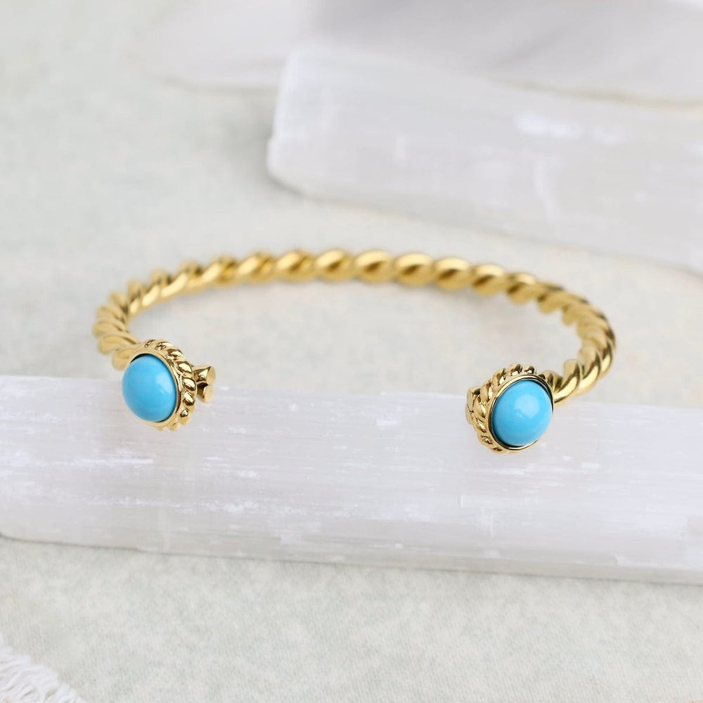 
                  
                    BRC-GPL PIPA BLUE/ The 2 blue stone bangle - 18k gold plat
                  
                