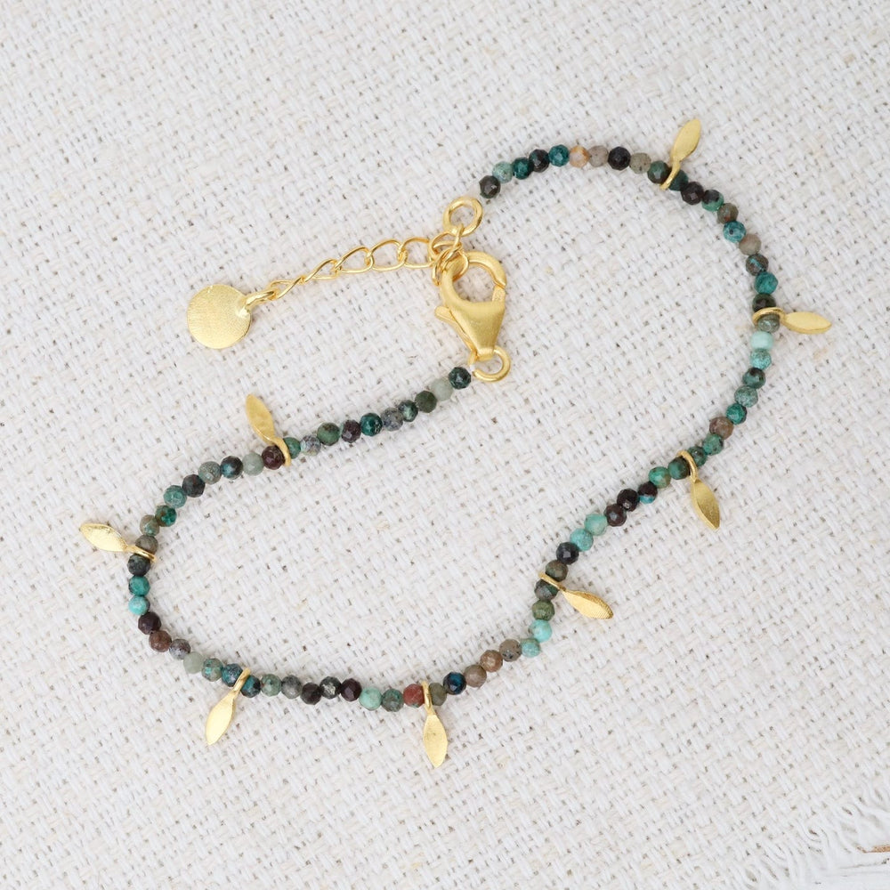 
                  
                    BRC-GPL Turquoise Faceted Beads with Gold Leaves Bracelet
                  
                