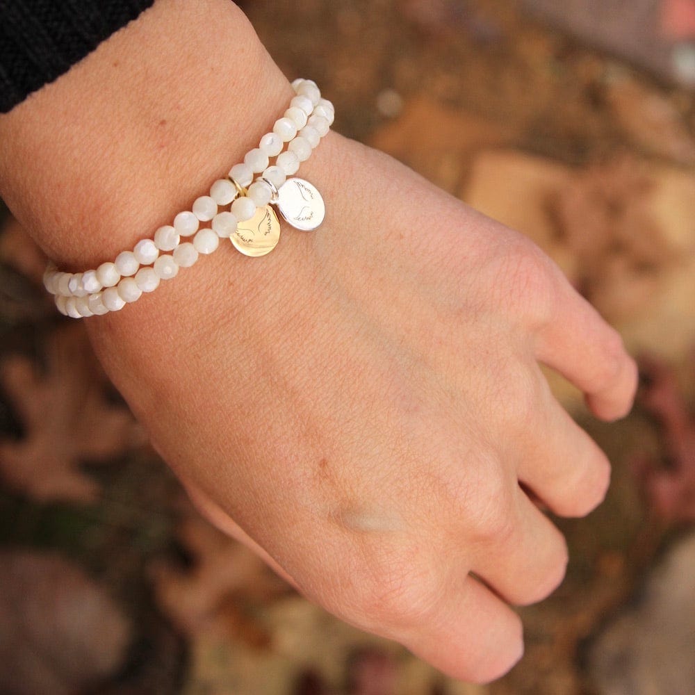 
                      
                        BRC Guardian Angel ~ Stretchy Mother Of Pearl Bracelet - Gold Charm
                      
                    