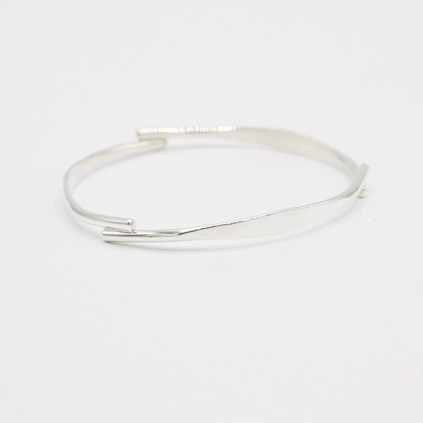 
                      
                        BRC Hammered Bangle with 3 Overlap Points
                      
                    