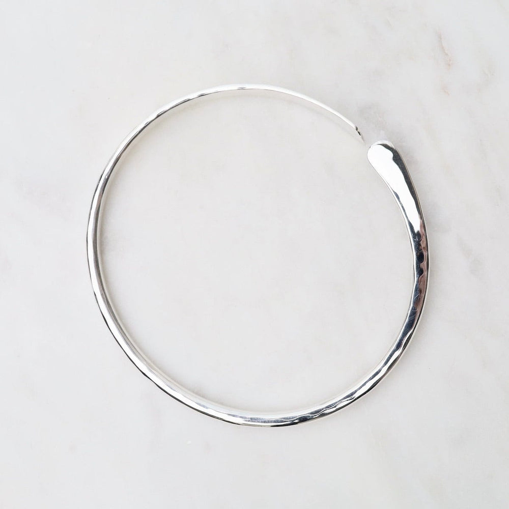 
                      
                        BRC Hammered Bangle with Mis-Matched Ends
                      
                    