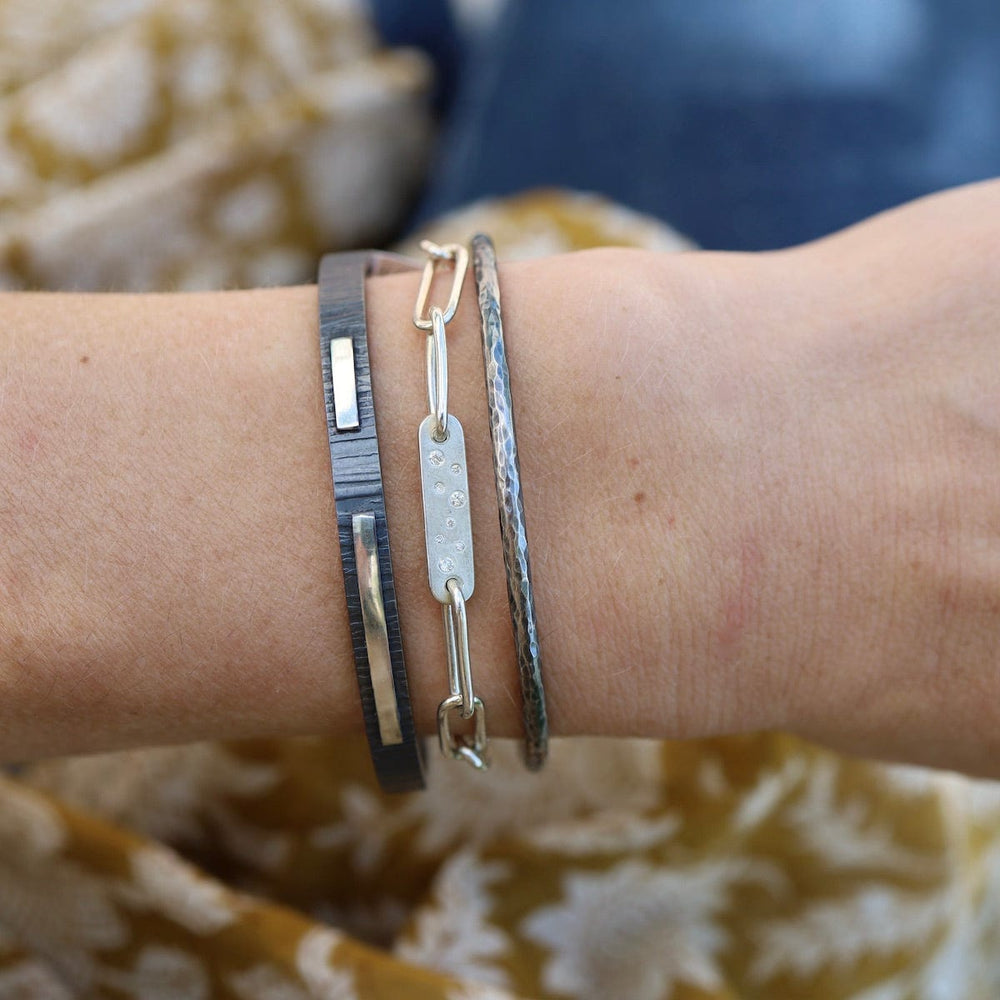 
                  
                    BRC Hammered Oxidized Silver Tee Shirt Cuff
                  
                