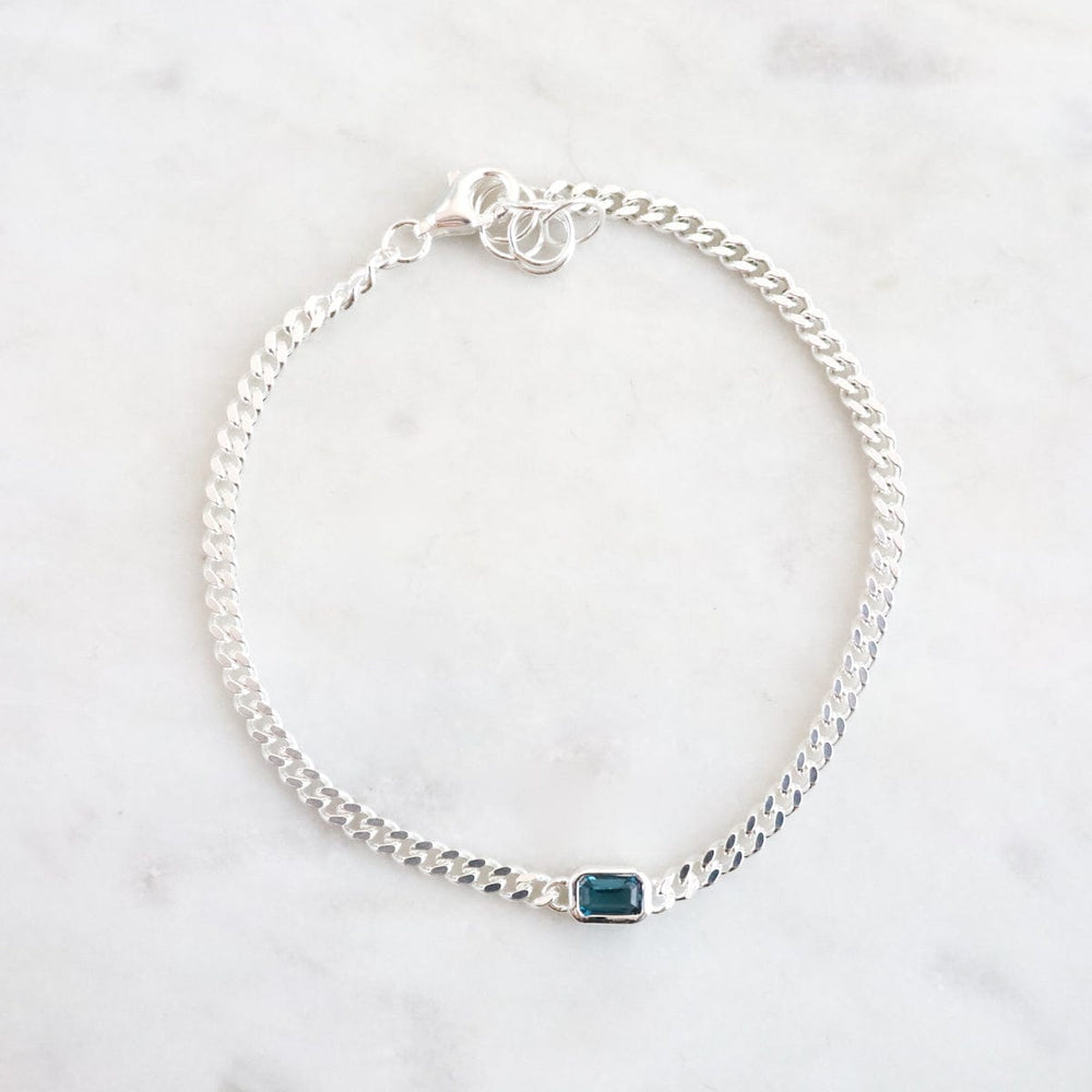 
                  
                    BRC Heavy Cut Curb Chain with Emerald Cut London Blue Bracelet
                  
                