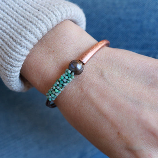 Load image into Gallery viewer, BRC-JM Chrysocolla with One Large Chocolate Pearl Hand Stitched Leather Copper 1/2 Cuff
